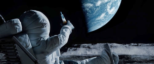 Astronaut Drinking On Moon.jpg