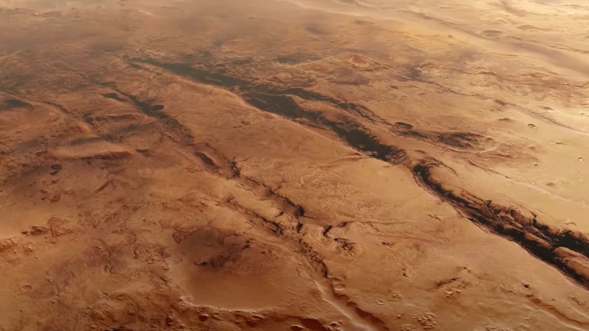 Vuela sobre los cañones marcados de Marte en este impresionante vídeo captado por una nave espacial europea