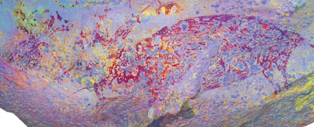 Pintura rupestre de una cacería de cerdos podría ser la historia más antigua jamás registrada: ScienceAlert
